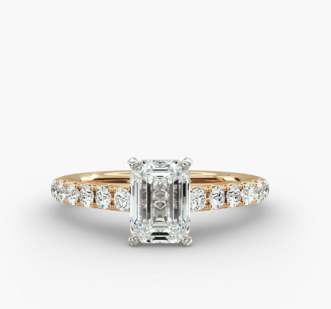 Diamond Engagement Ring In Emerald cut14KT Yellow Gold (1/2 Ct. Tw.)
