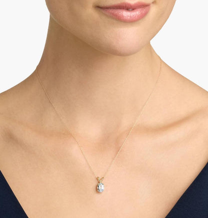Oval Birthstone Aquamarine Pendant Necklace In 14K yellow Gold (9x7mm)